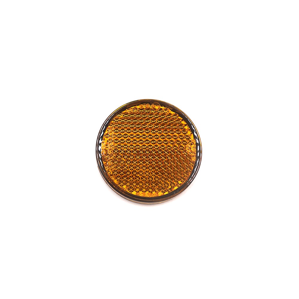Réflecteur rond orange vu de face