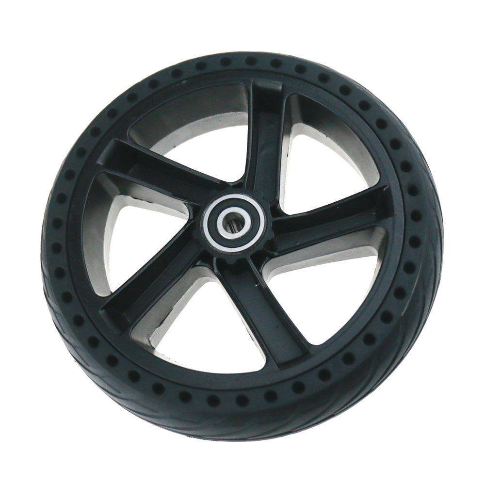 Roue complète noire avec pneu pleine alvéolé monté sur jante en aluminium