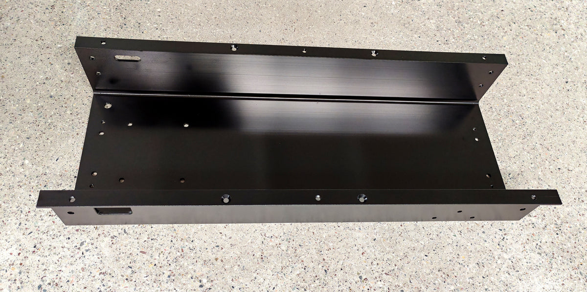 Châssis principal noir pour trottinette électrique Dualtron Achilleus posé sur un sol clair