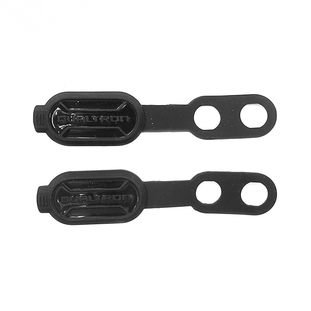 Deux caches noirs en caoutchouc pour port de charge avec le sigle Dualtron