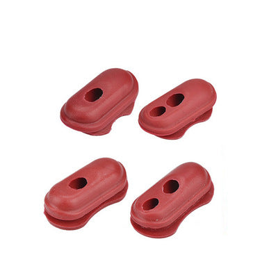 Quatre bouchons et protections de câble en silicone rouge